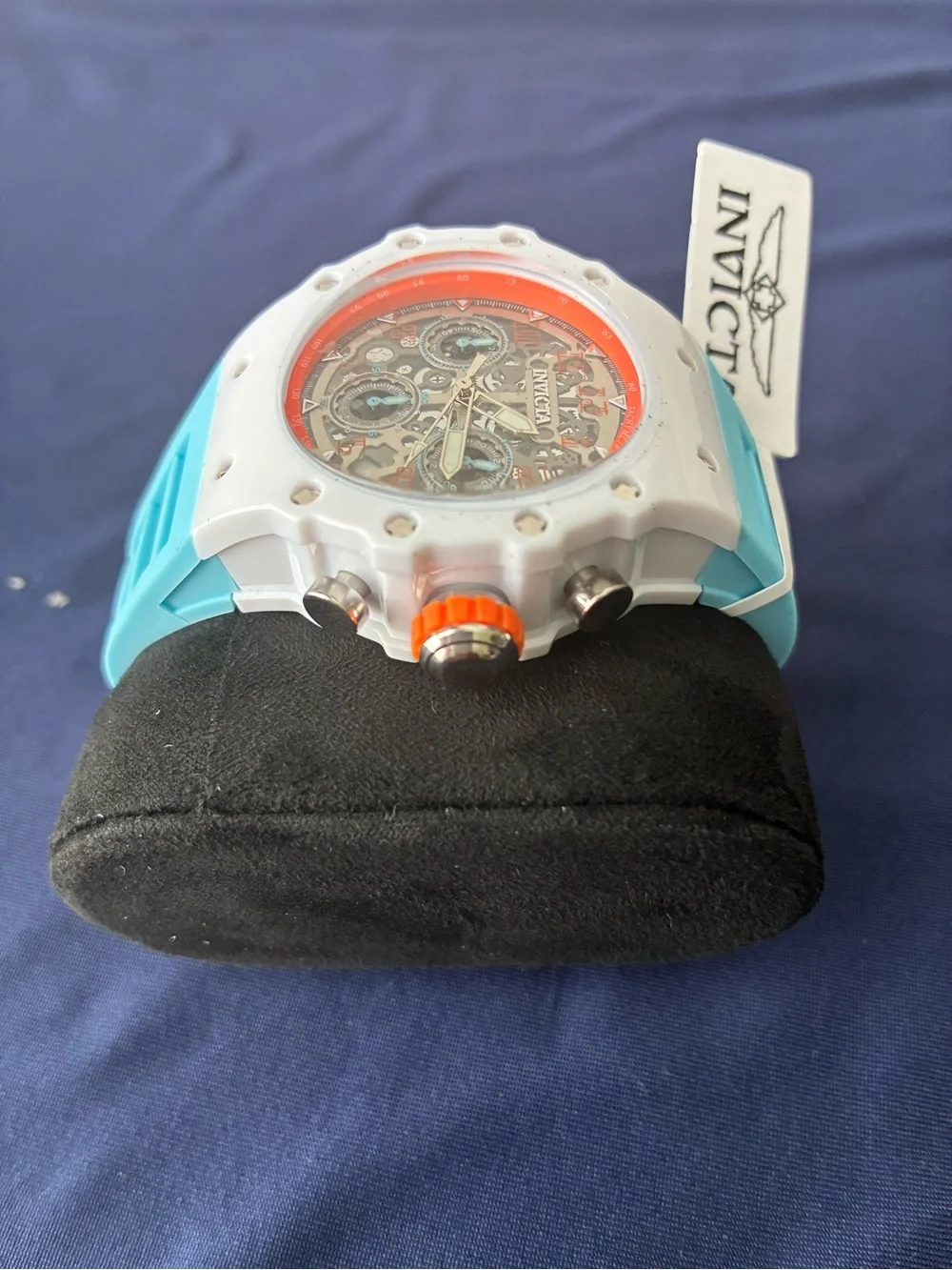Invicta White Watch with Coral Orange Bezel and Aqua Strap